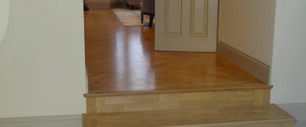 Solid European prime oak block floor installed in Fulham, sanded and varnished in situ.